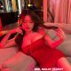 Attractive woman in red dress, hotel sex escort call girl booking services.