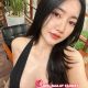 Attractive Malaysian woman in black top. KL Girl Service.