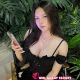 Attractive woman in black dress, KL escort outcall.