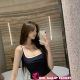 Attractive Kuala Lumpur escort posing in lingerie.