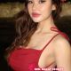 Attractive Malay woman in a red dress