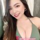 Attractive KL call girl Connie in a green bikini top. KL escort service.