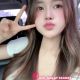 Young woman in a car, peace sign. Girl Malay Escort service.