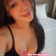 Attractive Malay woman in black bra. Real girl Malay escort service.