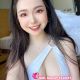 Attractive KL call girl in white swimsuit. Escort service.