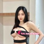 Attractive Malaysian woman in black lingerie. KL Girl Service.