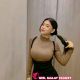 Attractive Malay woman in brown top and black skirt. Local escort service.
