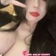 Attractive Kuala Lumpur escort girl making peace sign. Trusted agency.