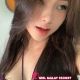 Celine, KL escort outcall, in a purple top at a 5-star hotel.