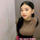 Attractive Malay woman in brown top and black skirt. Local escort service.