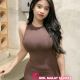 Attractive Malay woman in brown dress. Melayu Escort service.