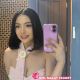 Misa, a Malay call girl, in a pink top. KL escort outcall.