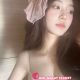 Attractive Kuala Lumpur escort in a beige bra. Premium outcall service.