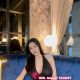 Attractive Malaysian woman in a black dress. KL Girl Service.