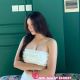 Celine, a KL escort outcall, poses in a 5-star hotel room.