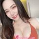 Attractive KL call girl in a red swimsuit. KL escort service.