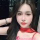 Attractive young woman in red dress. Malaysia escort service.